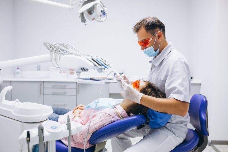 woman-patient-dentist-min